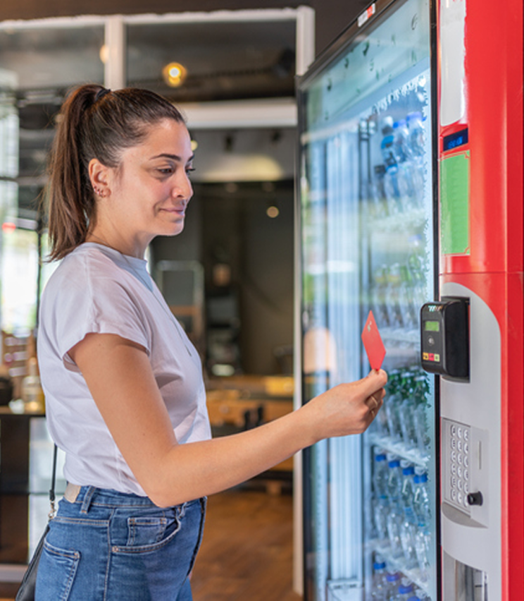 Customer paying with card for beverage